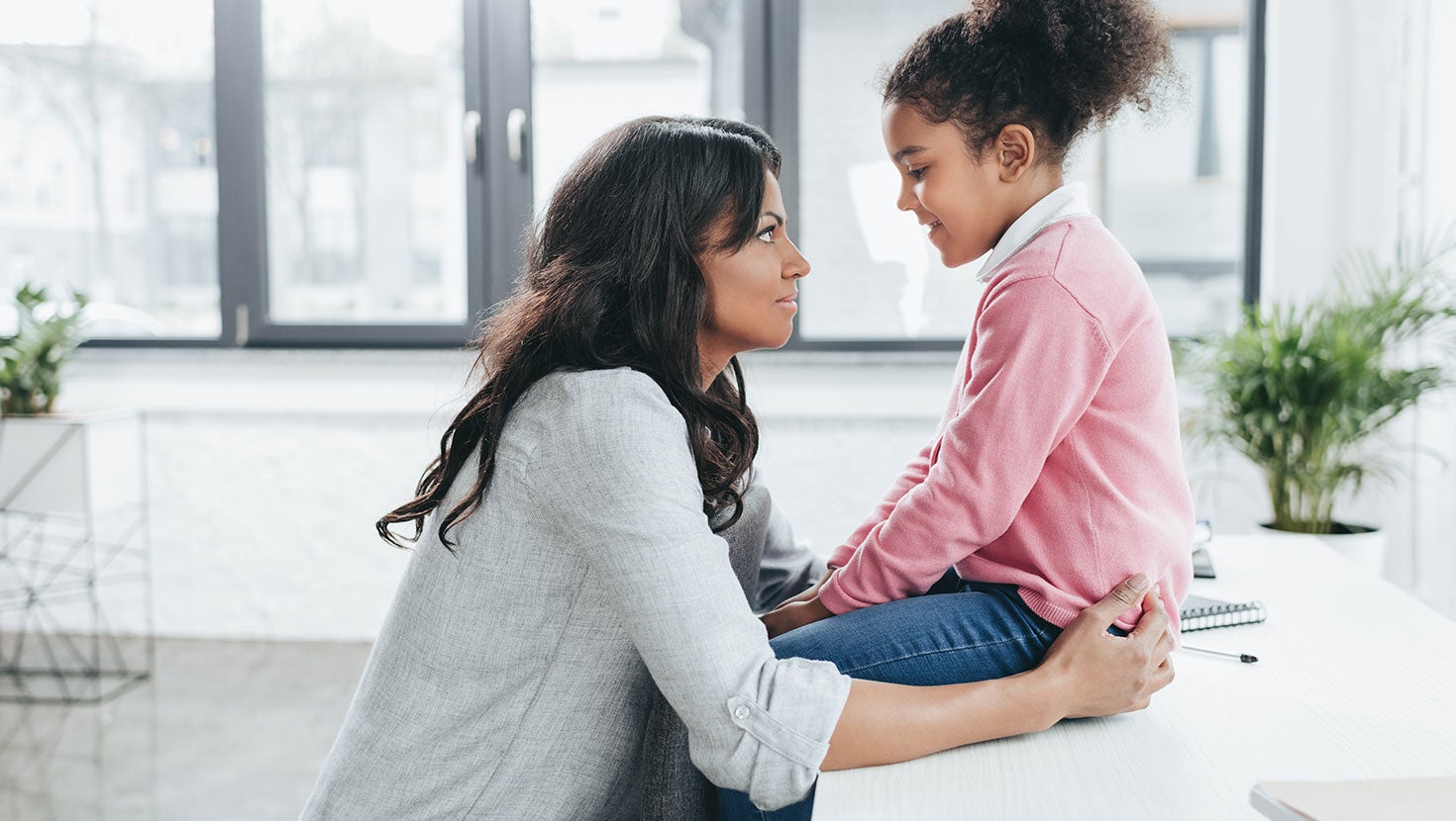 Mother having a conversation with her daughter