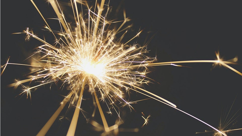 Image of sparkler on dark background